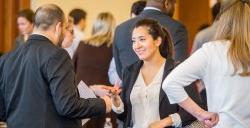 Photo of student speaking with representative at Career Fair.